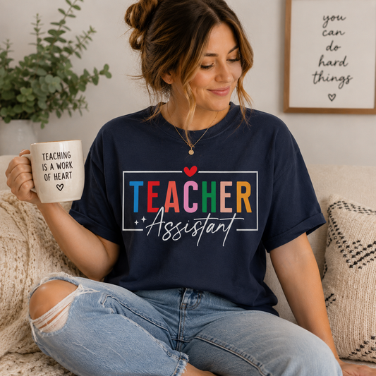 Teacher Assistant Colorful Dark Tee — Comfort Colors